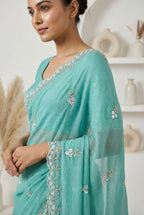 Aqua Blue Crunchy Chiffon Saree with Hand-Embroidered Scalloped Borders & Sequin Floral Motifs