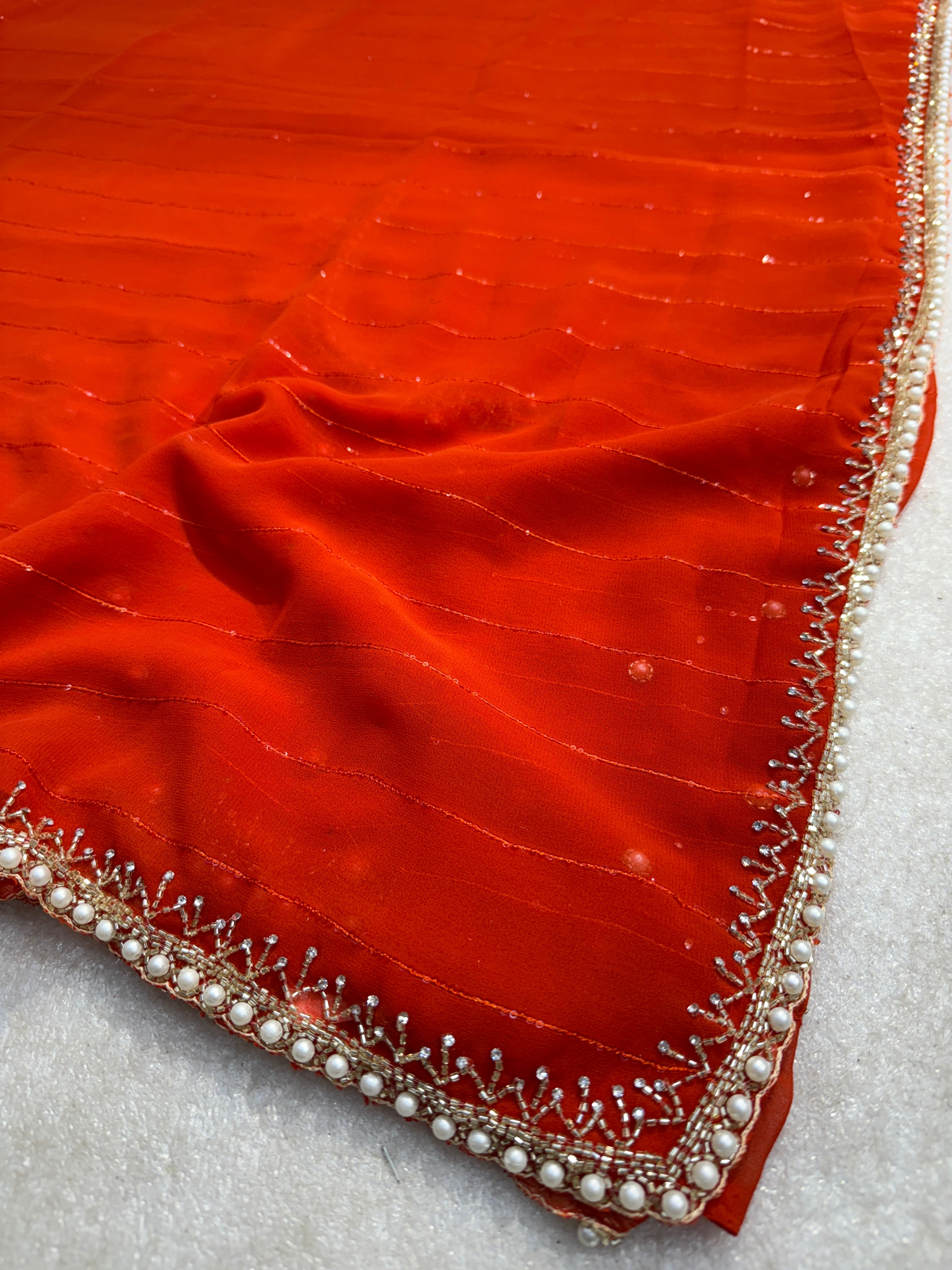 Rust Orange Georgette Saree with Handcrafted Pearl & Sequin Border