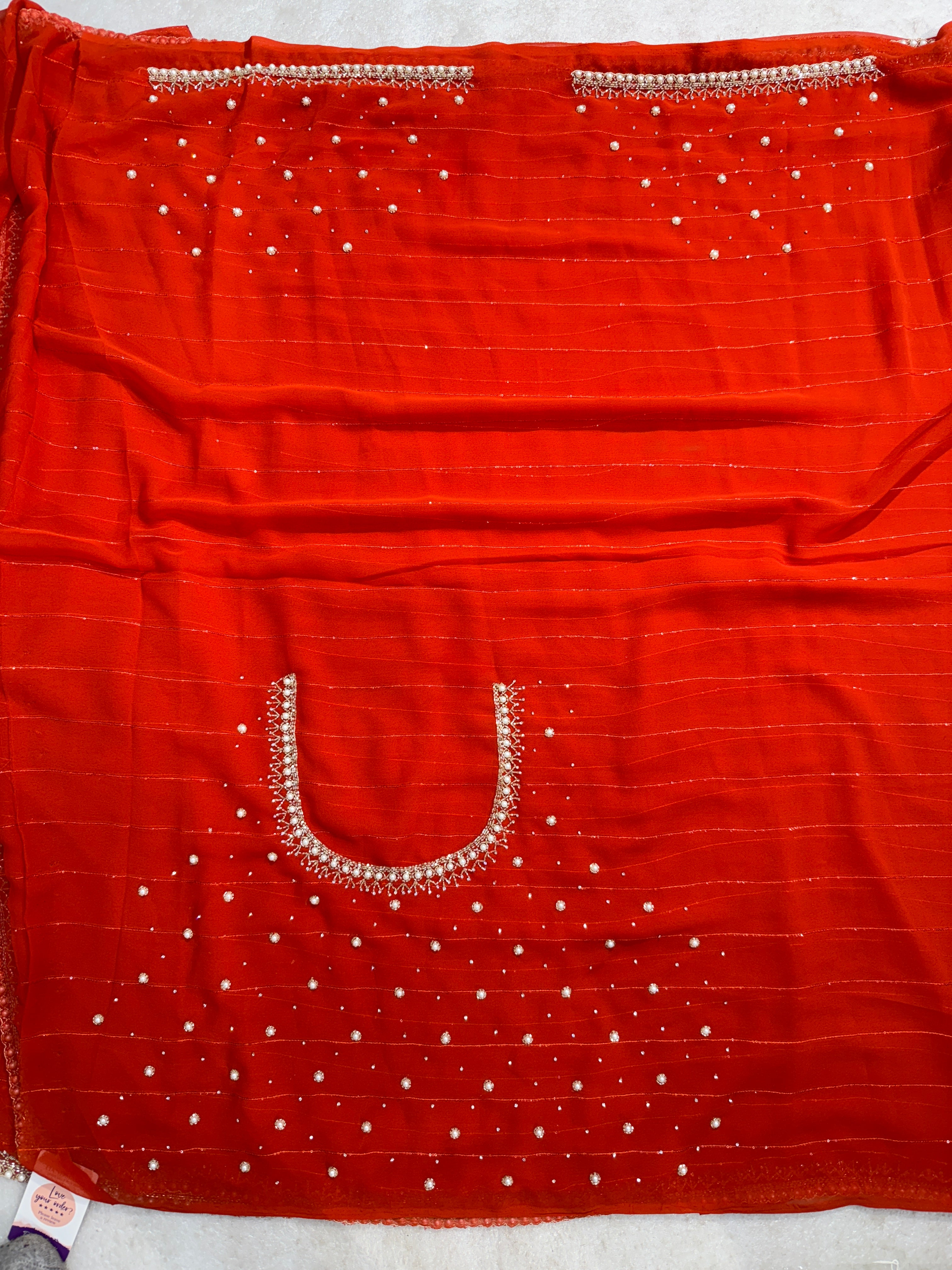 Rust Orange Georgette Saree with Handcrafted Pearl & Sequin Border