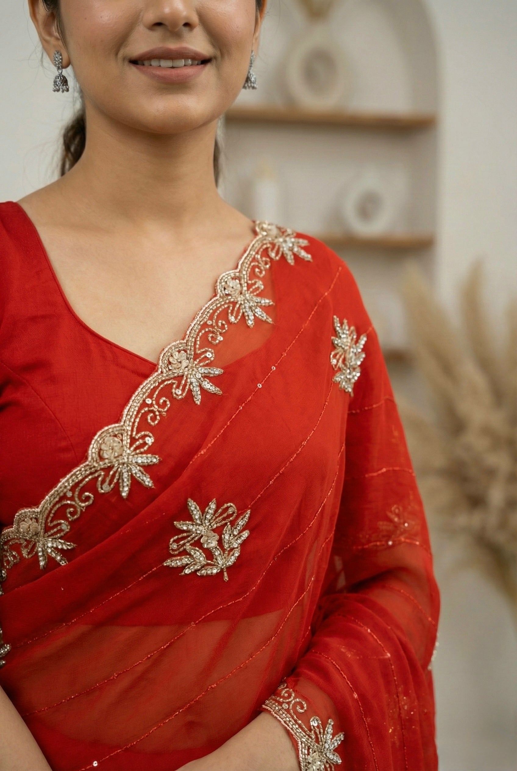 Royal Zari Exclusive: Rust Orange Georgette Handwork Saree with Unstitched Blouse