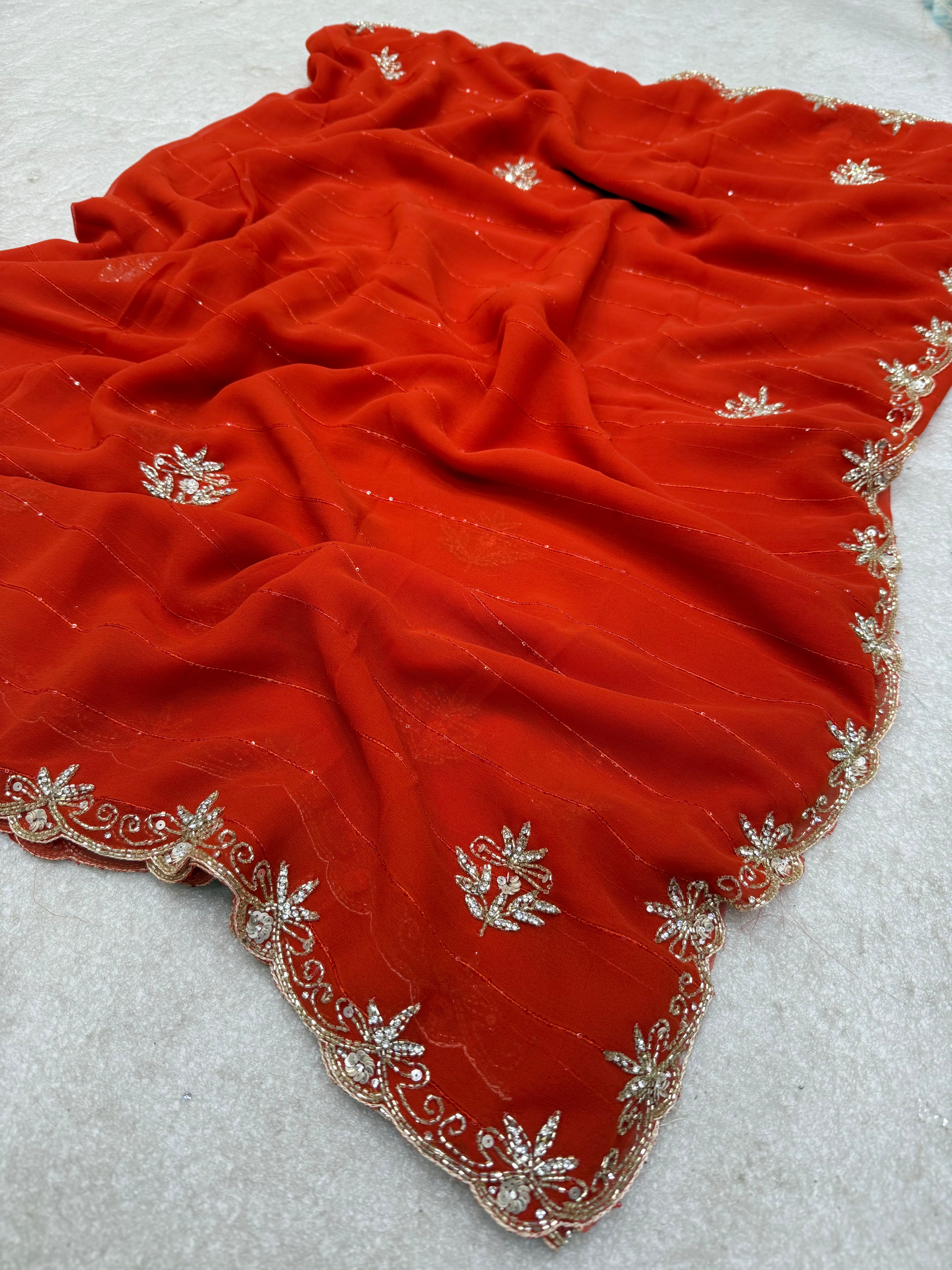 Royal Zari Exclusive: Rust Orange Georgette Handwork Saree with Unstitched Blouse